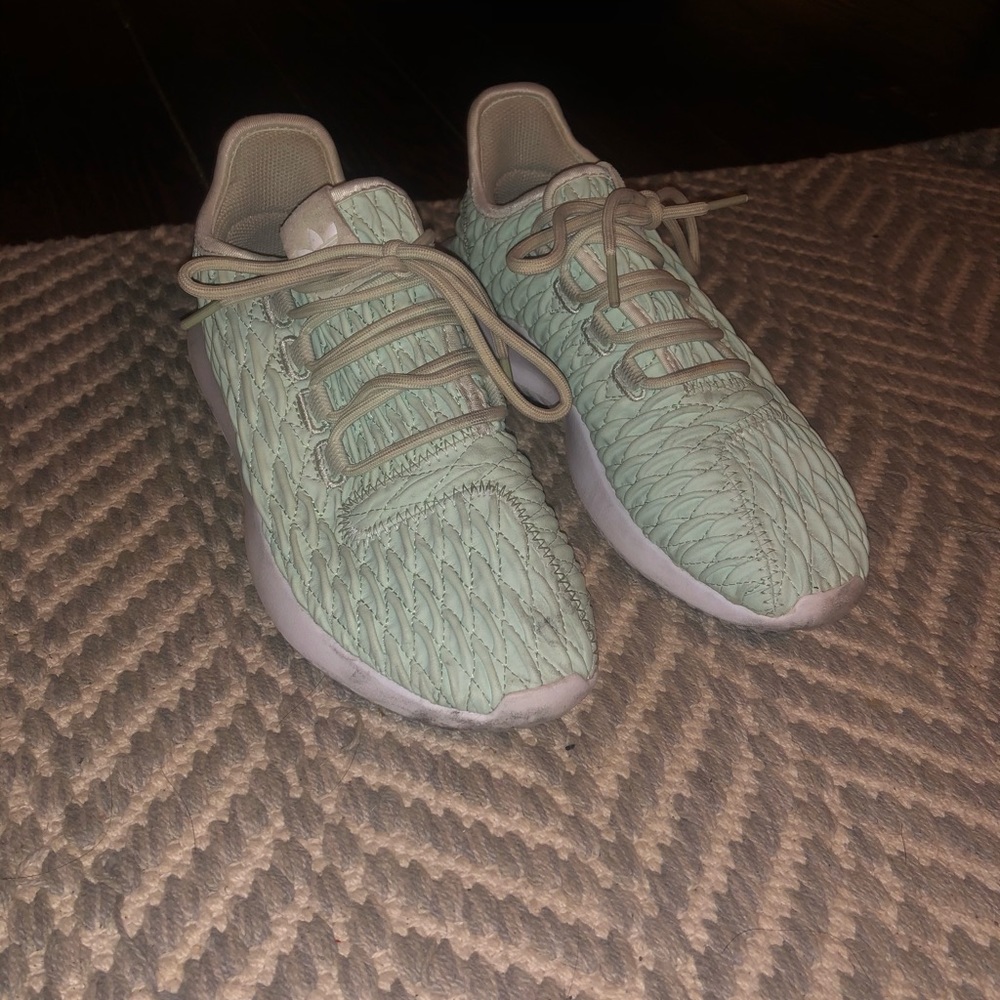 Pale green adidas tubular sneakers